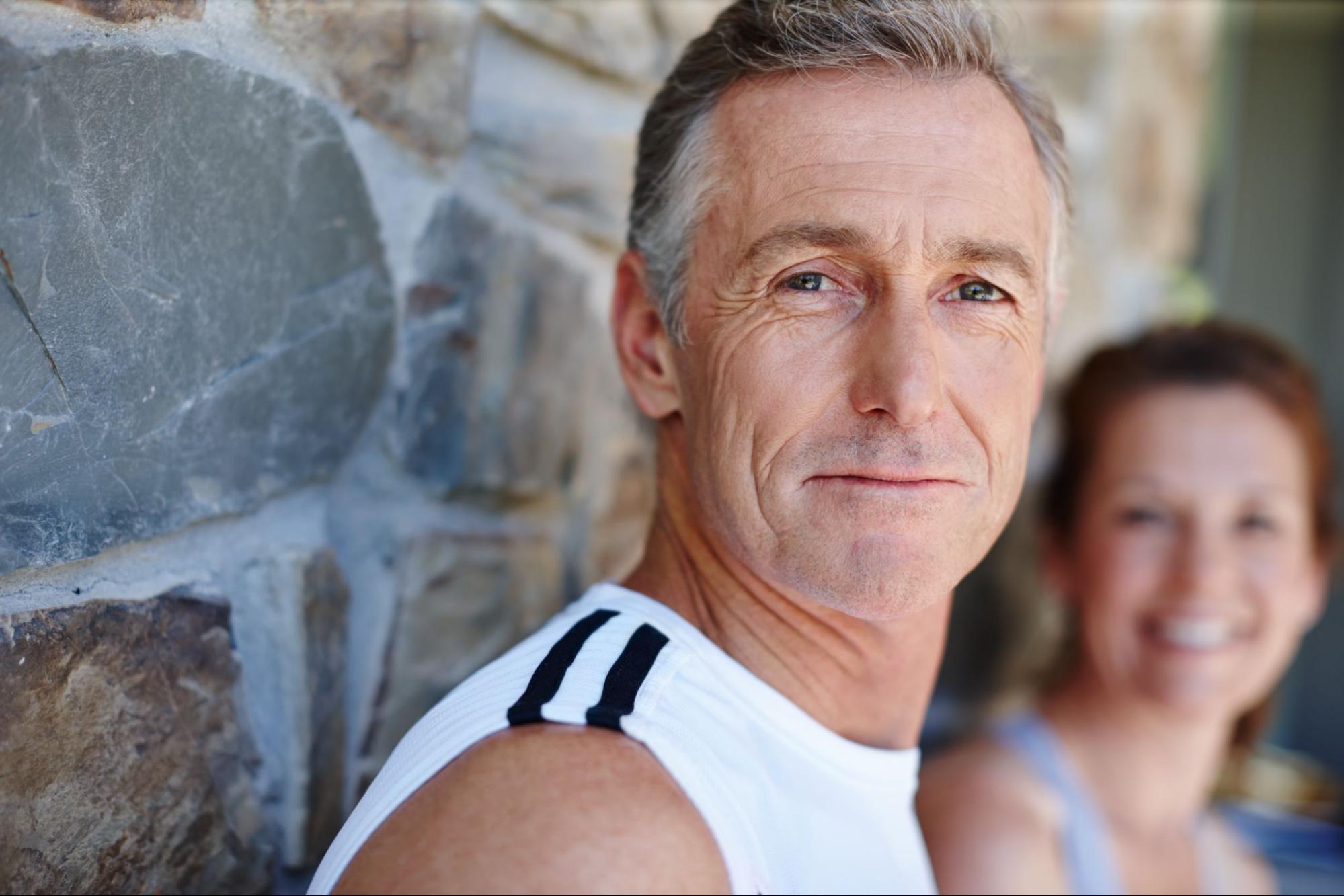 Closeup on a middle-aged man looking refreshed after HRT.